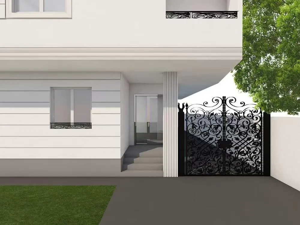 Palilulska Oaza building entrance with iron gate and landscaped garden